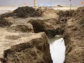 Just Drains technician clearing a residential drain line at a New Jersey job site