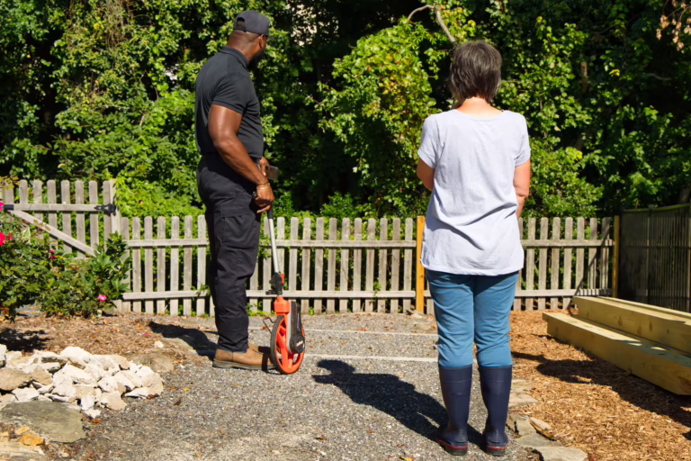 Sewer camera inspection with homeowner in backyard